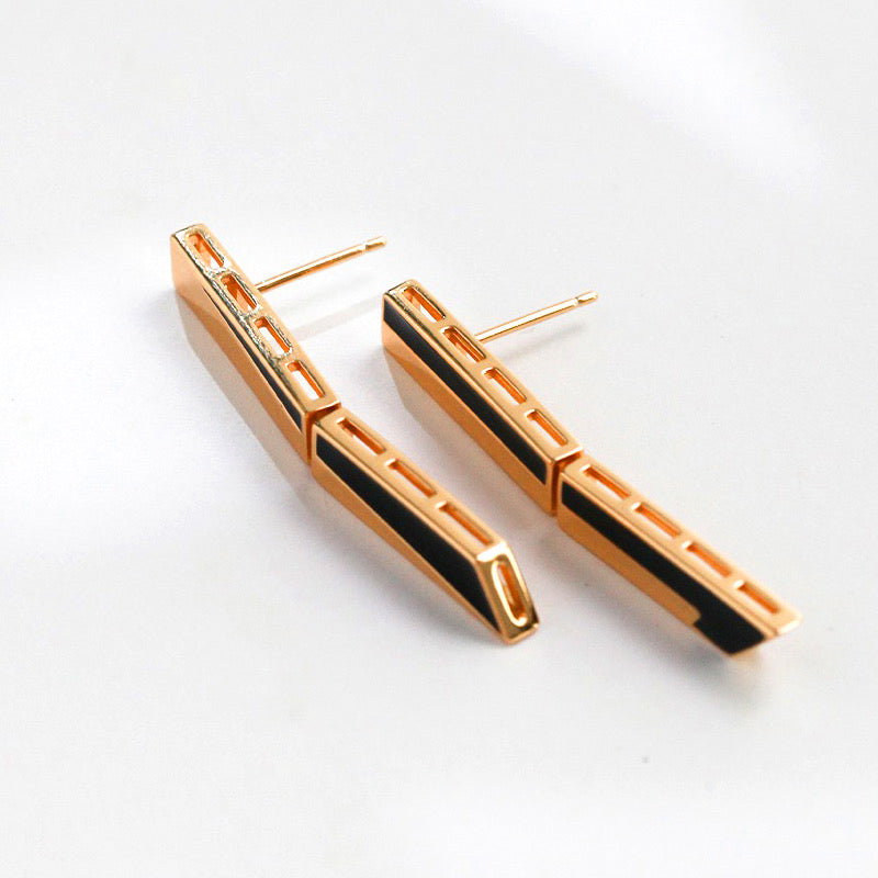 Drop glaze earrings in geometric shapes